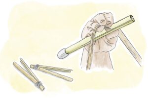 煮た原皮を「エービ」という手作りの竹ばさみでしごくと中から繊維が出てきます。