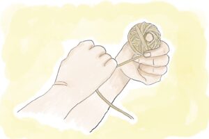 苧を毬状に丸めます。